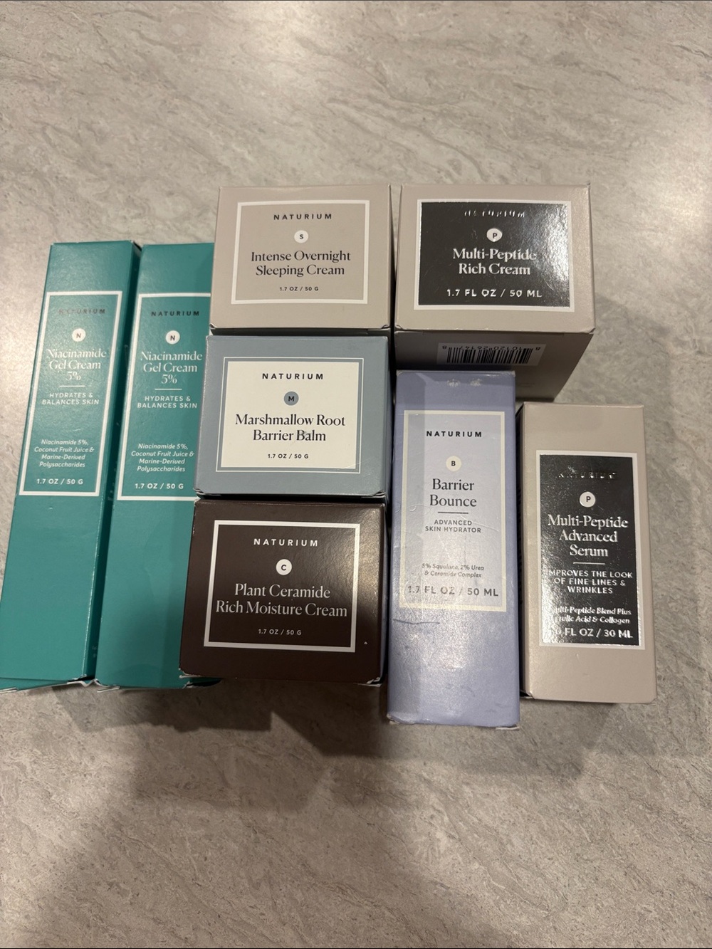 NATURIUM Skincare Set - Teal, Brown, Lavender, White Boxes